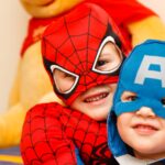 kids in spiderman and Captain America costumes