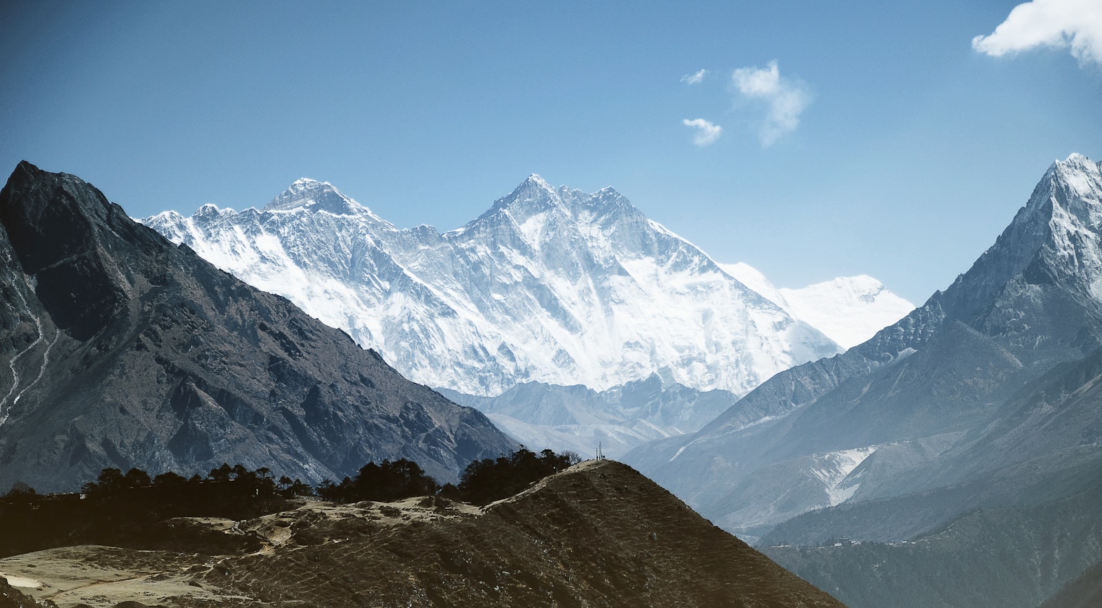 snow coated mountains during daytime