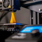 a close up of a machine with a blue light on it